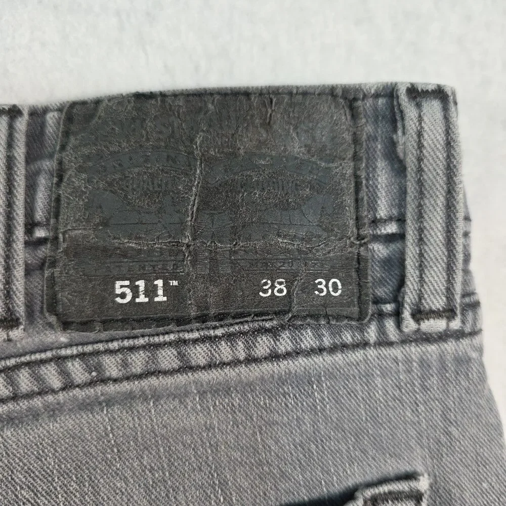 Levi's 511 Jeans Denim Mid Rise Slim Fit Men's size 38x30 Tapered Zip Fly Grey